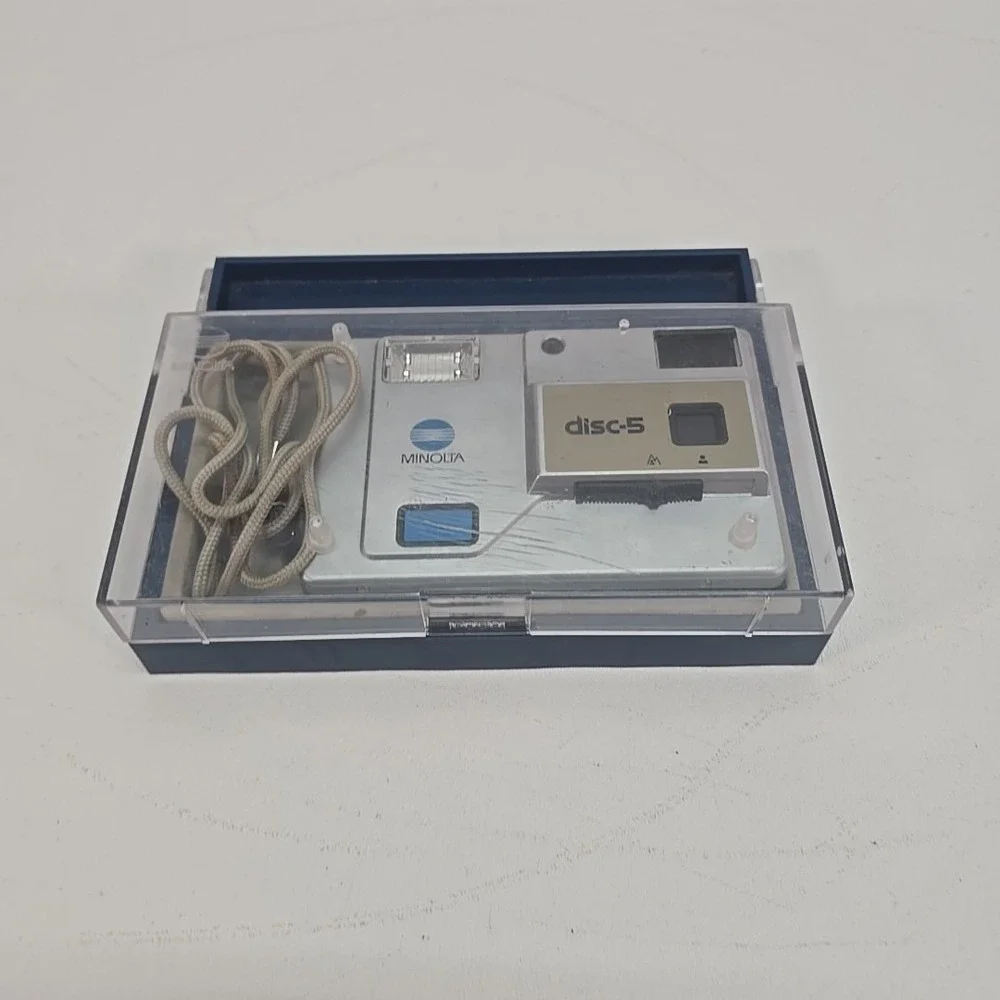 Minolta Disc‎ 5 Disc Film Camera, silver, with Case